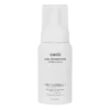 cadó Curl Defining Foam for bouncy curls, providing soft hold and natural volume for all curl types.