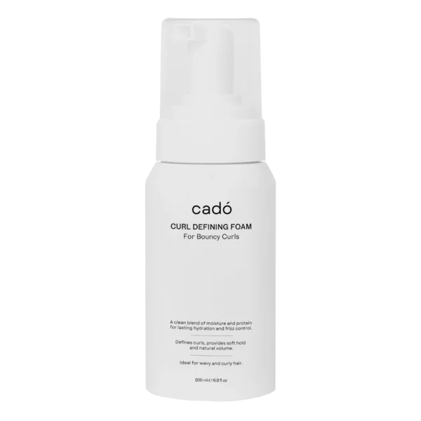 cadó Curl Defining Foam for bouncy curls, providing soft hold and natural volume for all curl types.